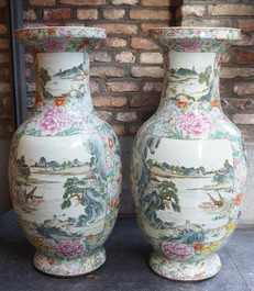 A large pair of Chinese famille rose millefleurs vases with landscape panels, Qianlong mark, 19th C.